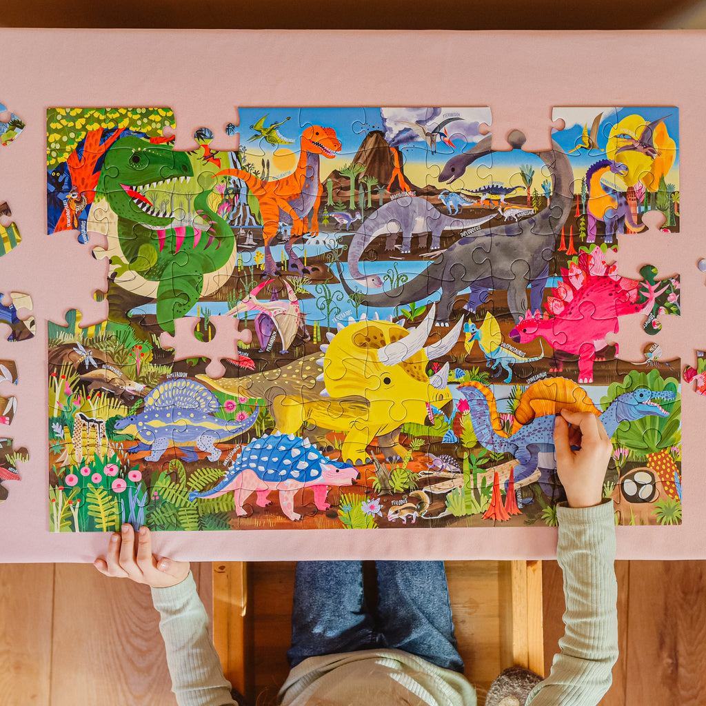 Puzzle 100 piezas Tierra de Dinosaurios