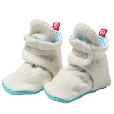 Botas polar turquesa y crema